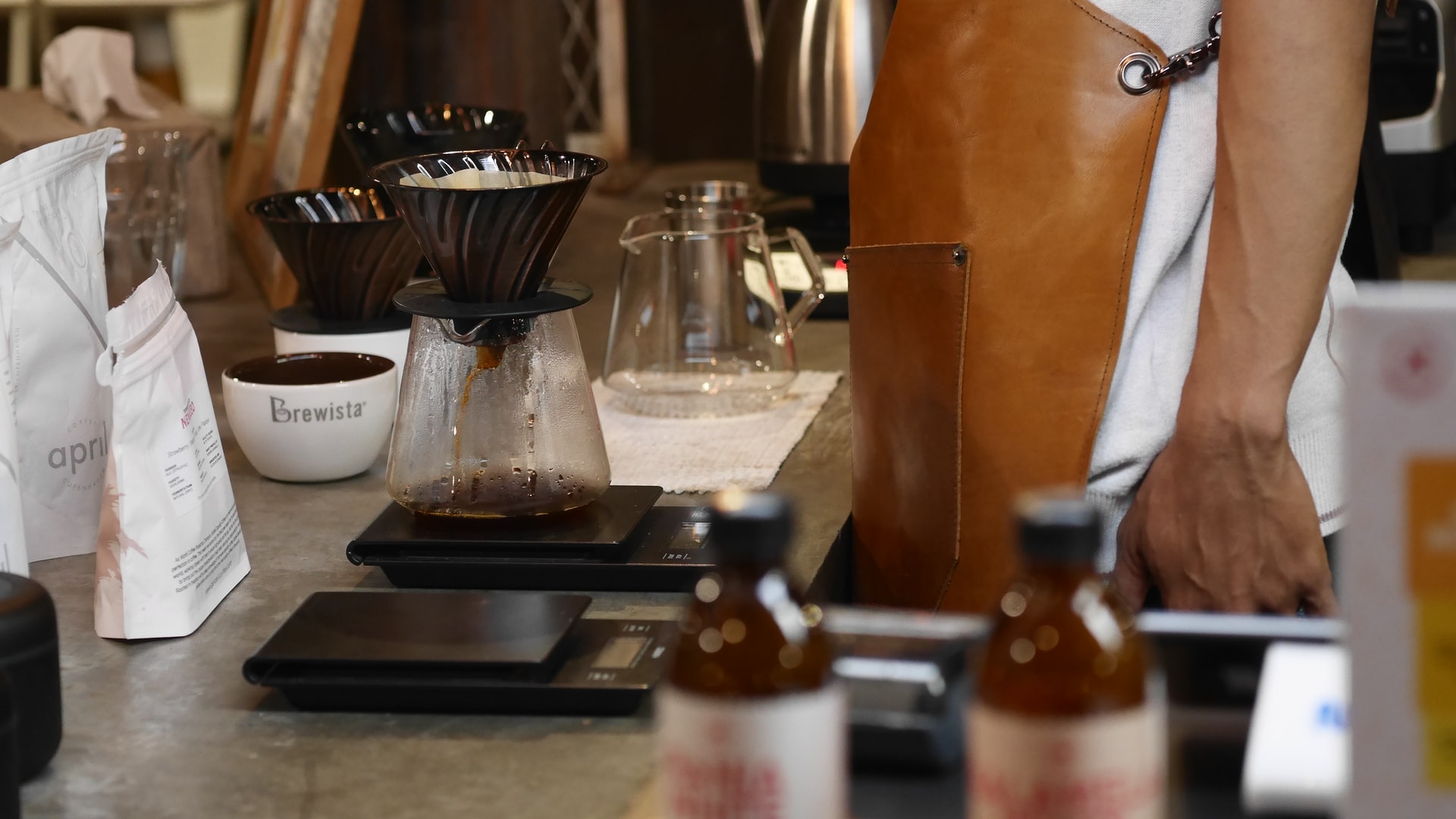 Man standing beside a coffee brew